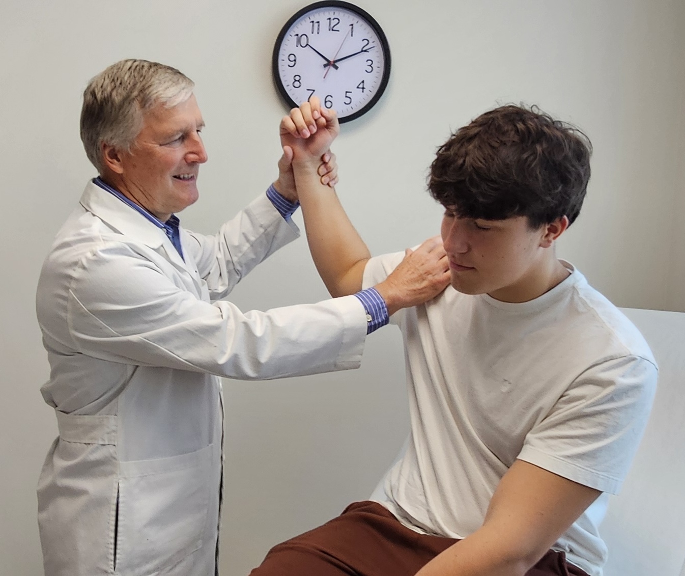 Dr. Andrew Combs with patient 2
